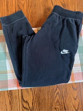 Nike Kids Black Joggers with White Swoosh Logo